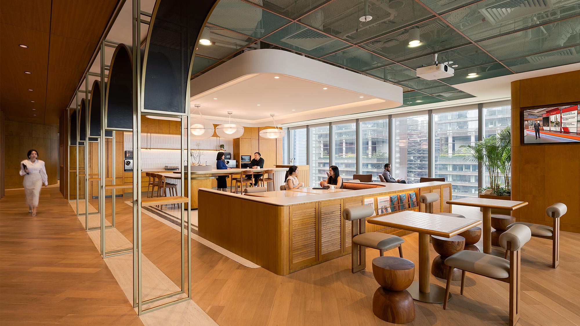 A large room with tables and chairs.