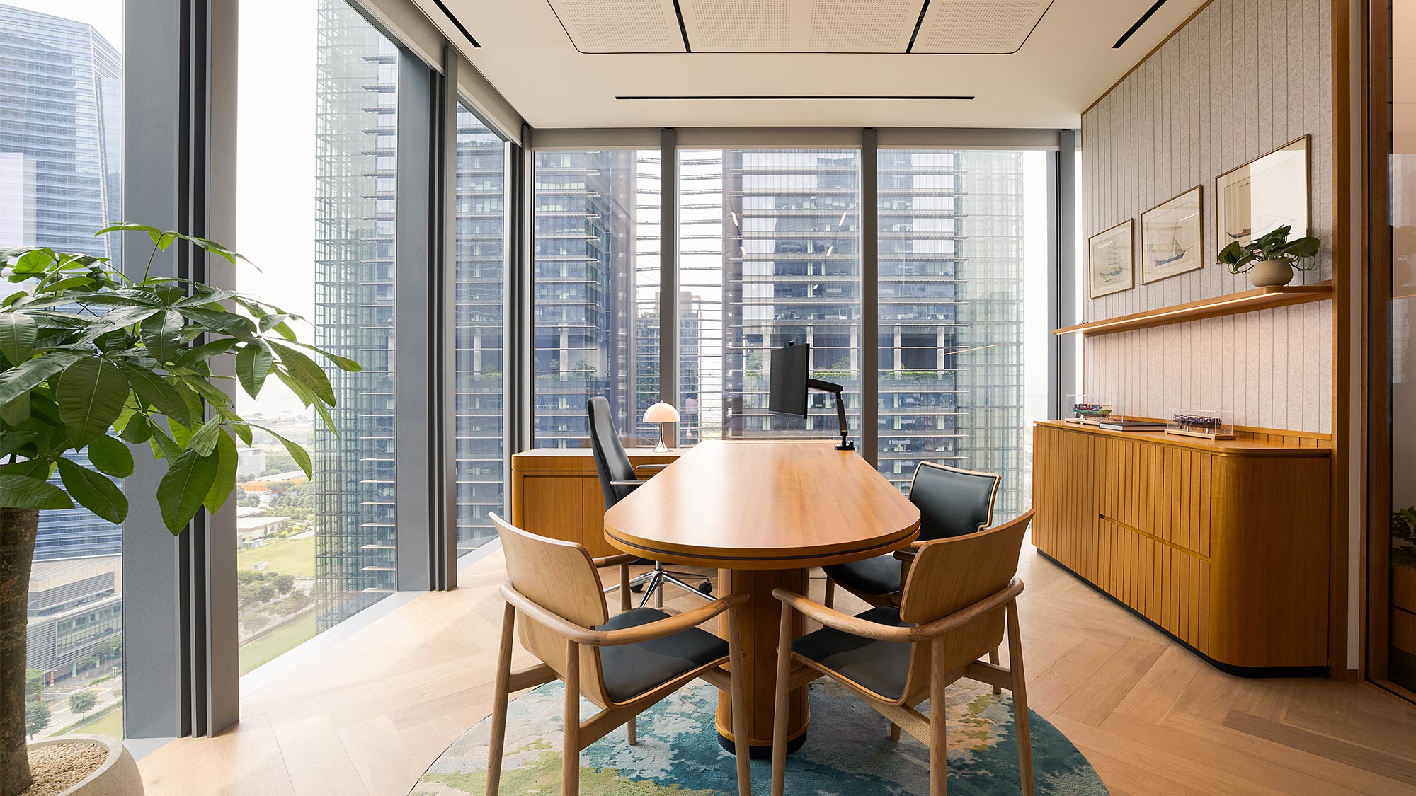 A room with a table and chairs.