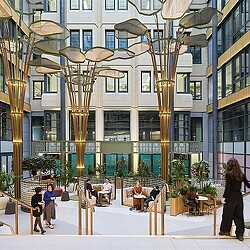 A group of people outside a building.