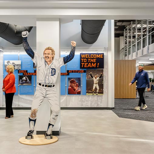 A person in a white suit.