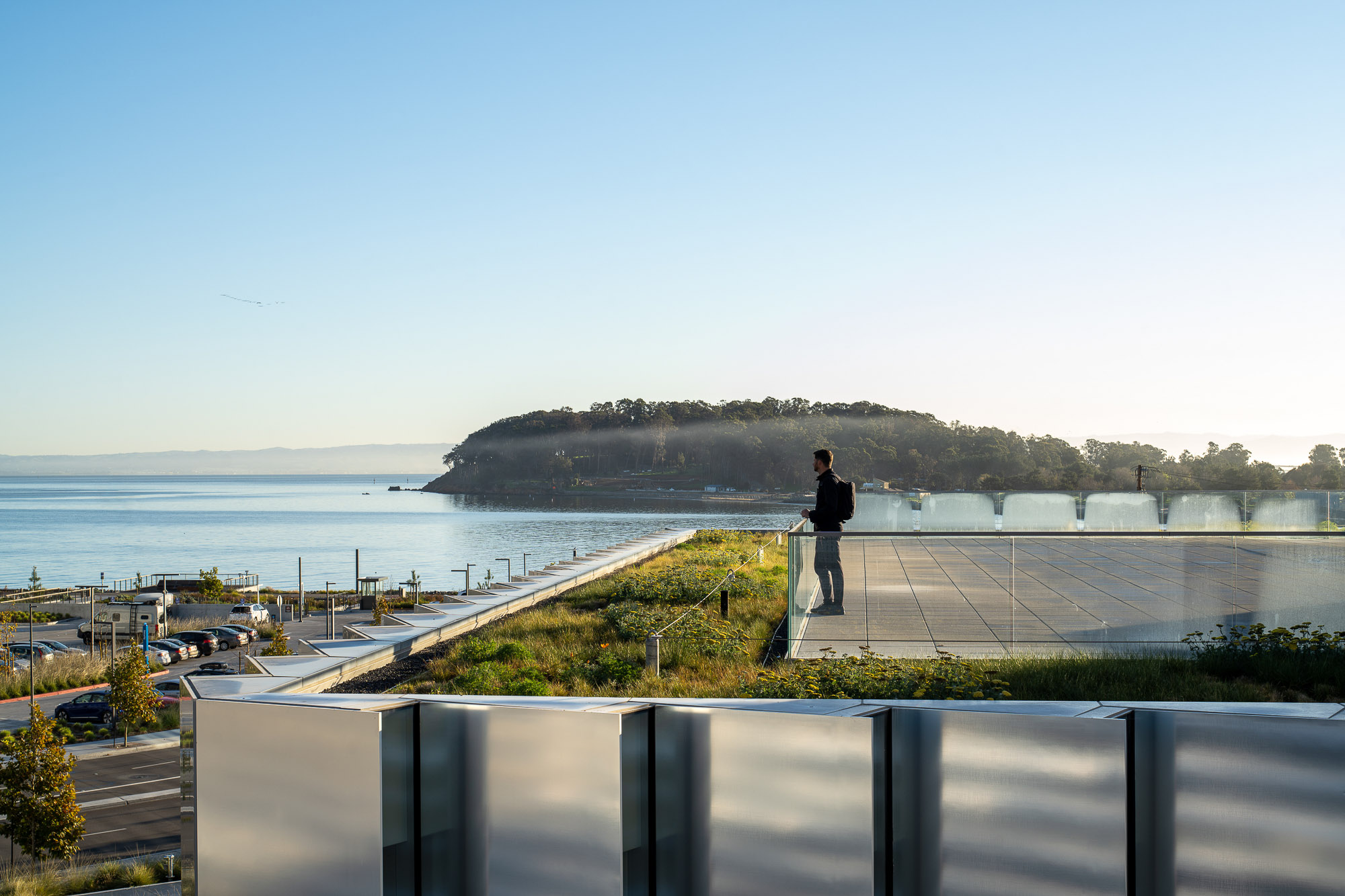 A person standing on a roof.