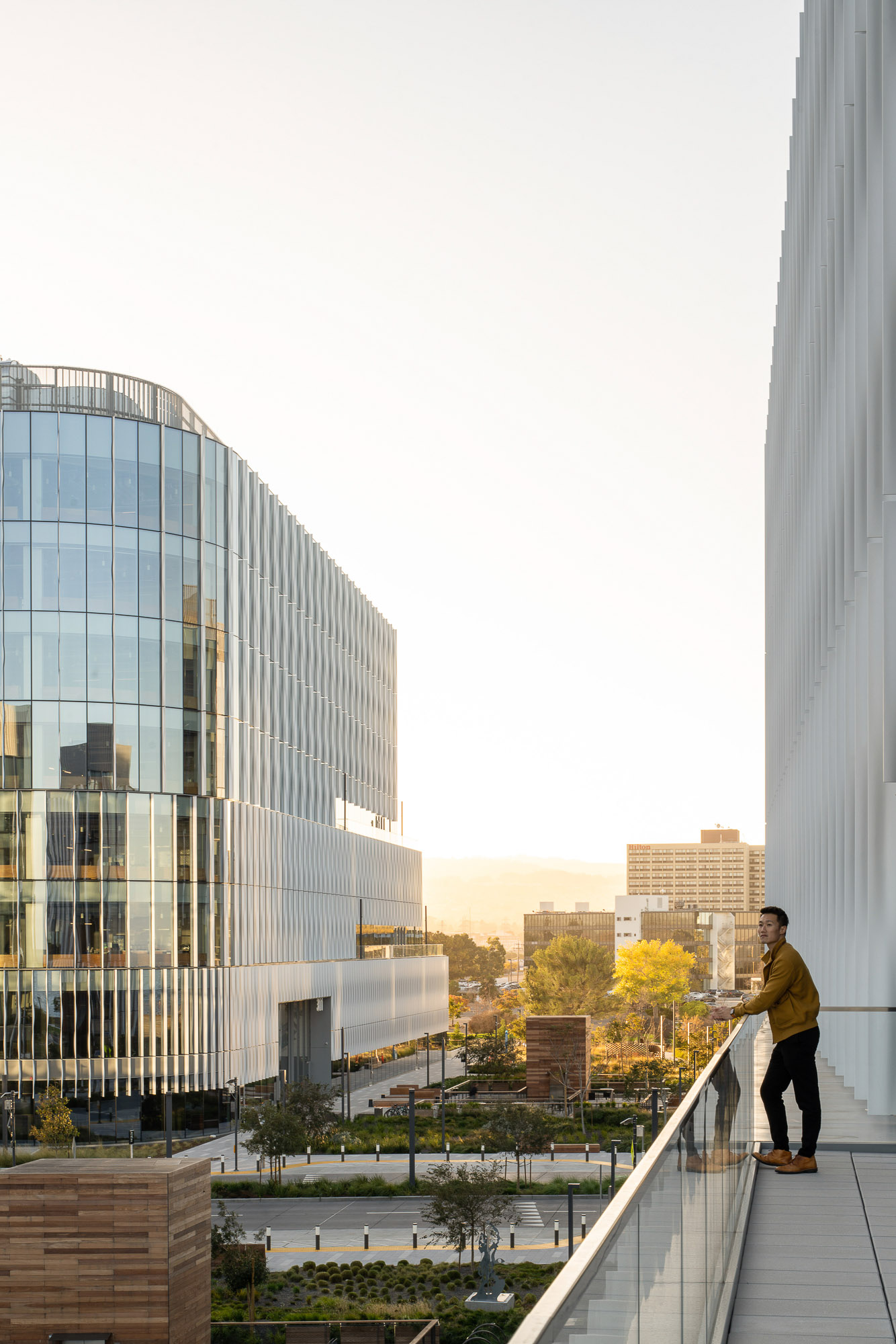 A person standing on a ledge.