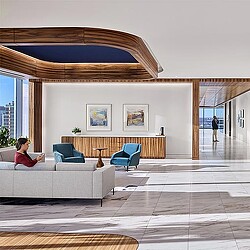 A person sitting on a couch.