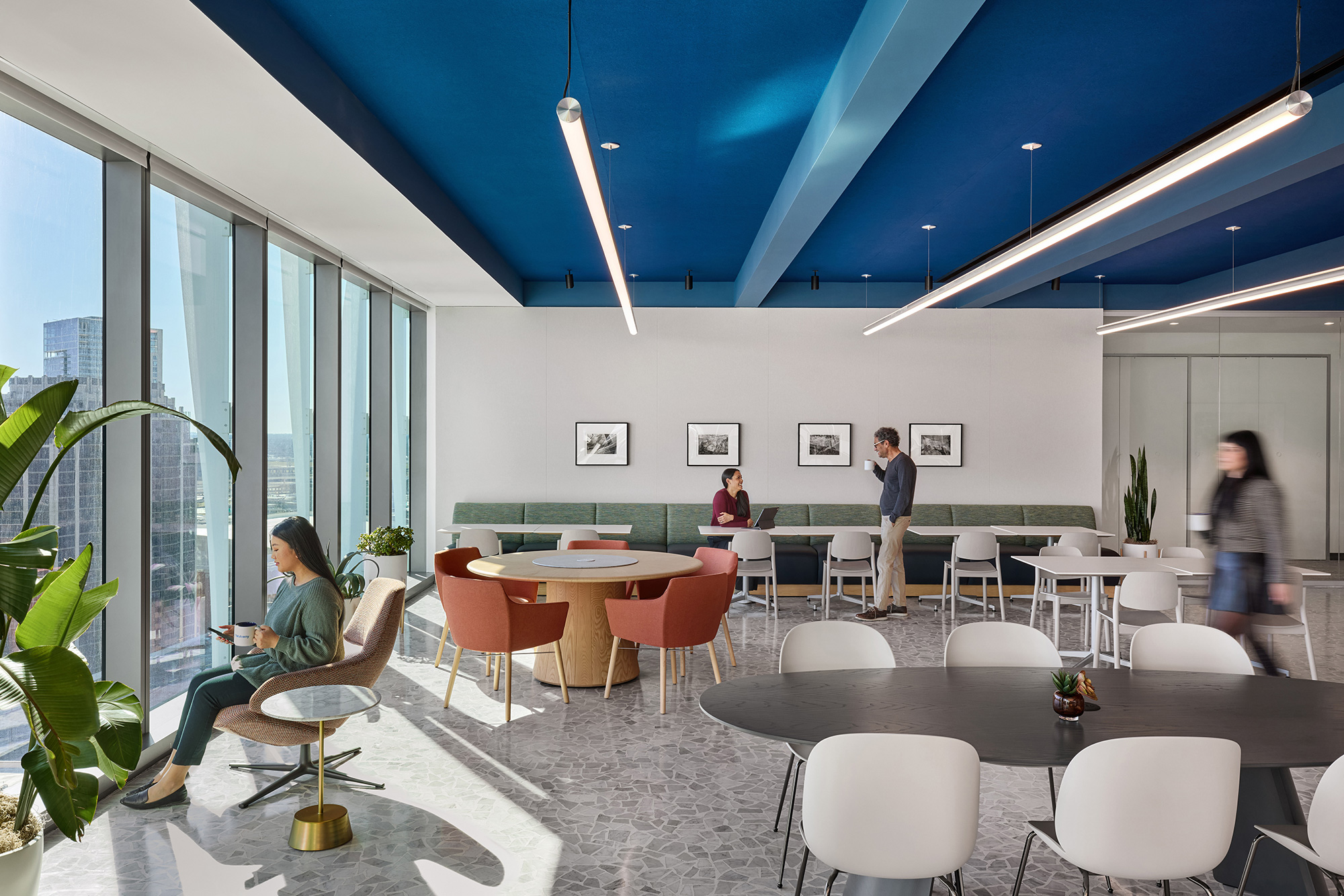 A room with tables and chairs.