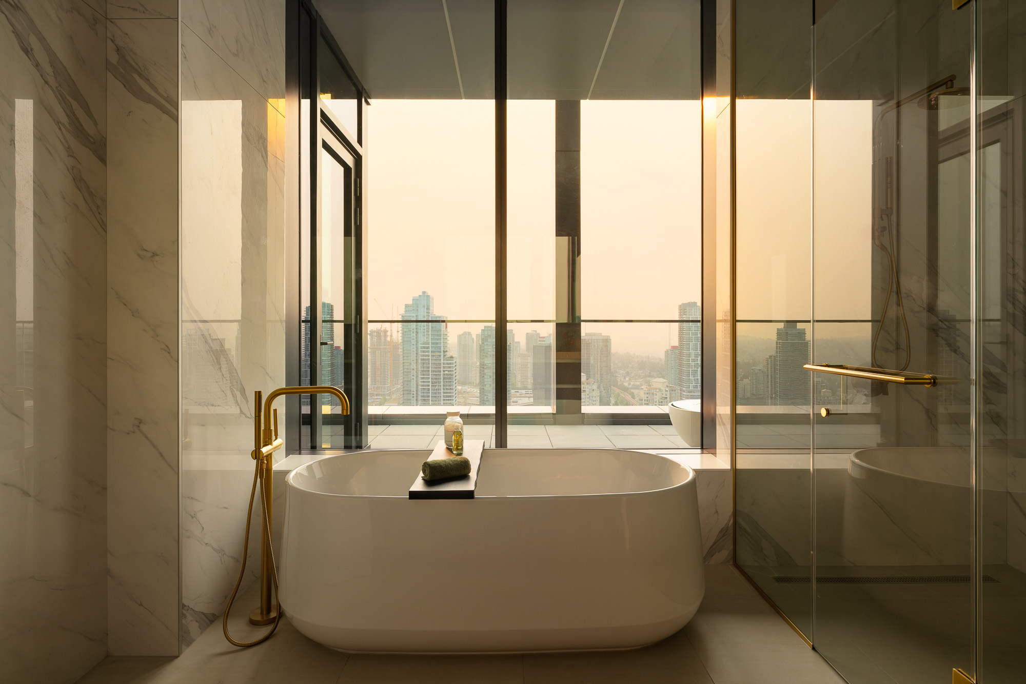 A bathroom with a large window.