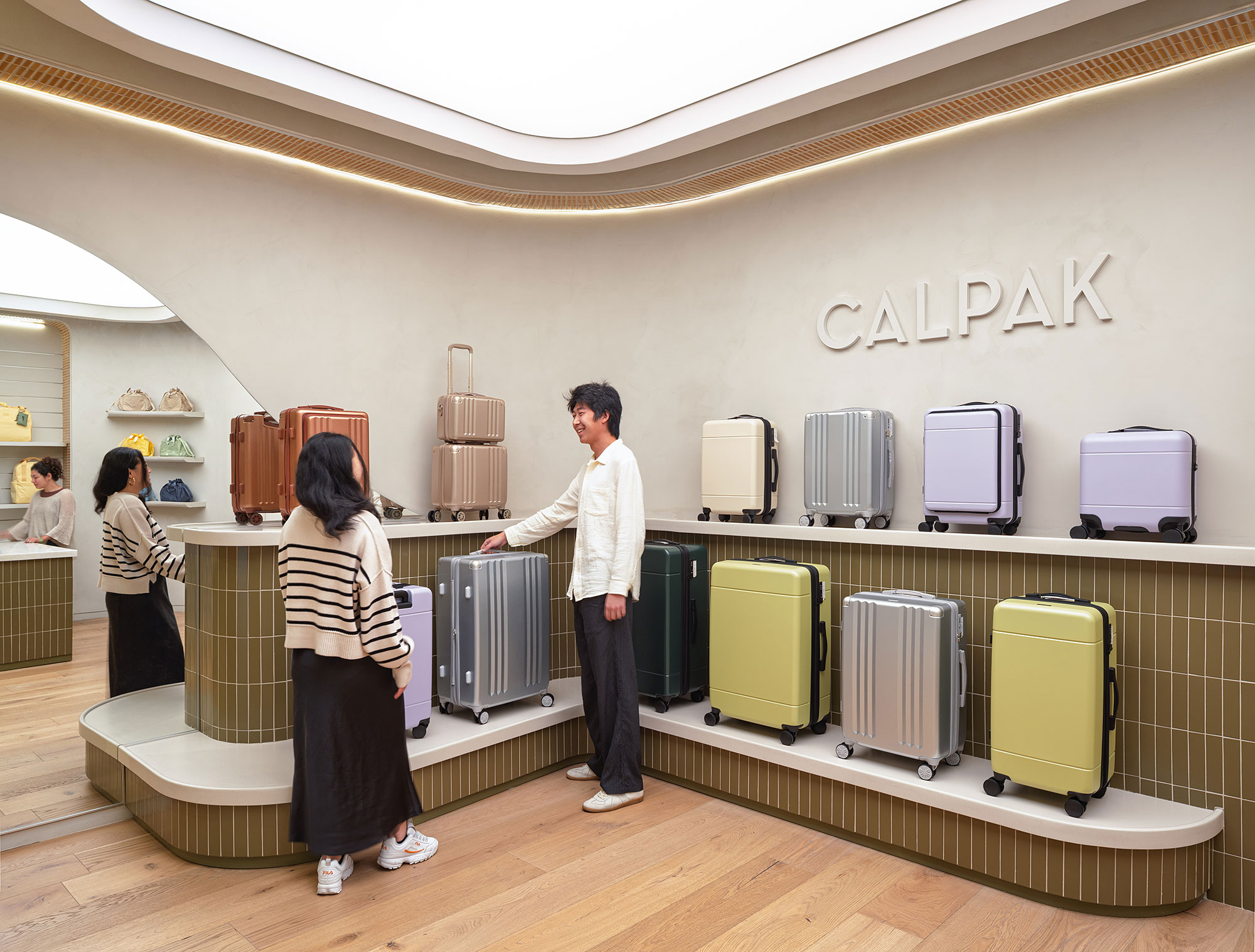 People standing in front of a display.