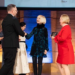 A man and a woman holding hands.