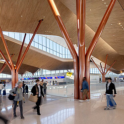 People walking in a large building.