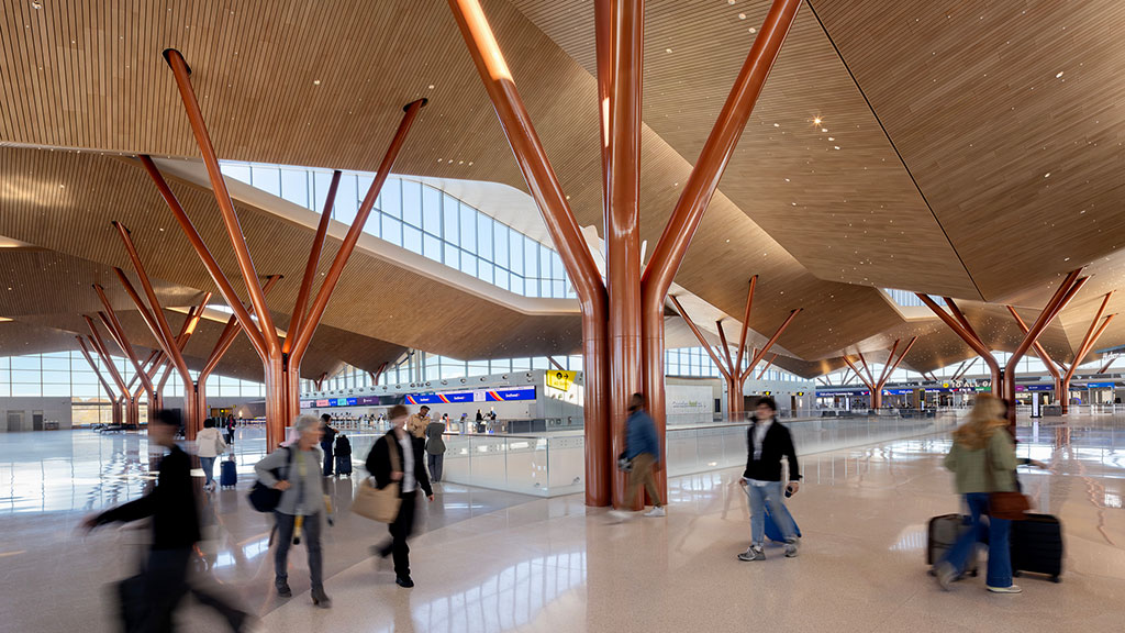 People walking in a large building.