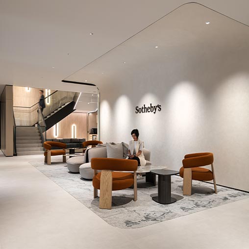 A person sitting on a couch.