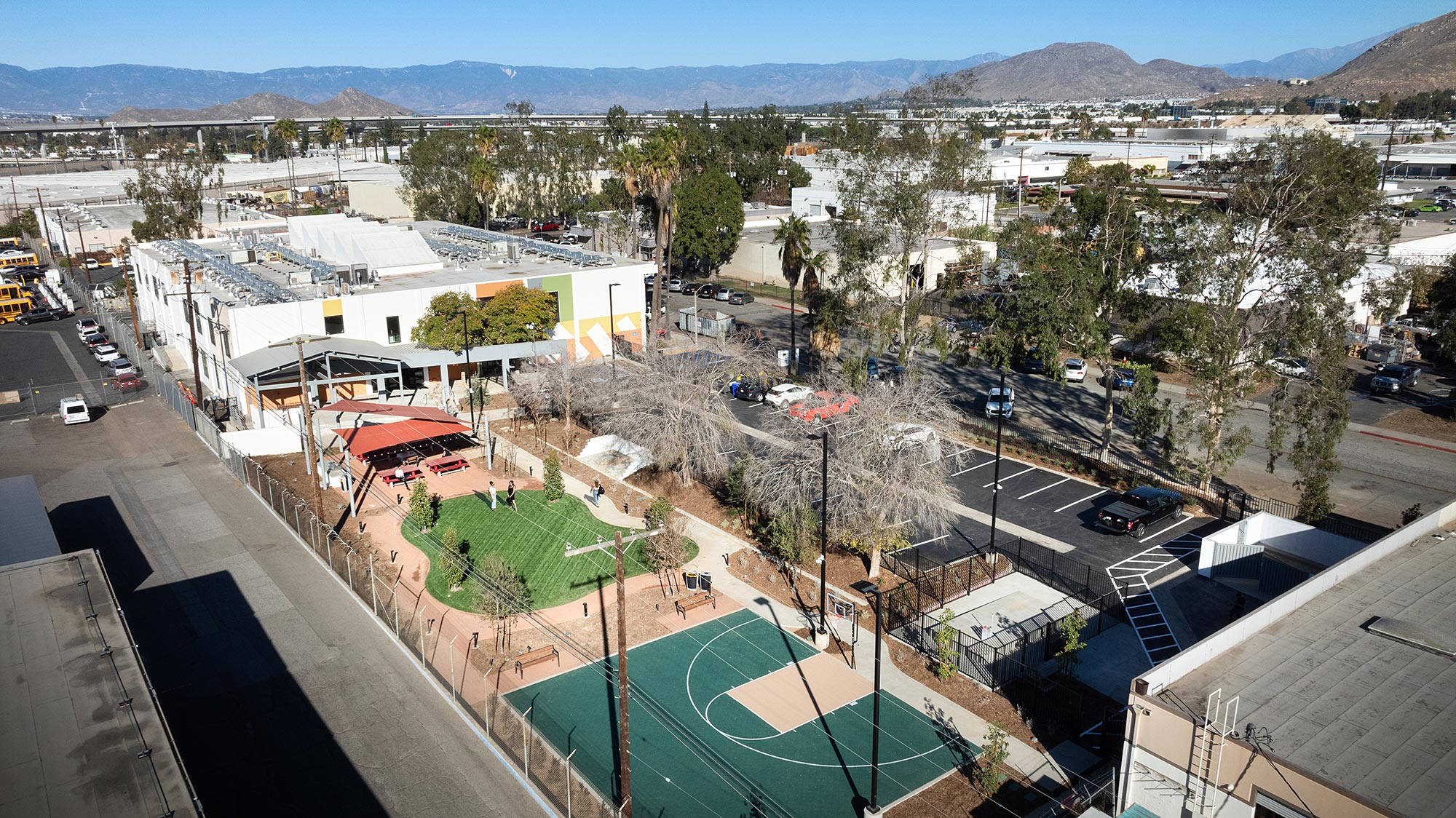 A city with many buildings and trees.