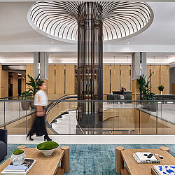 A person walking in a large room.