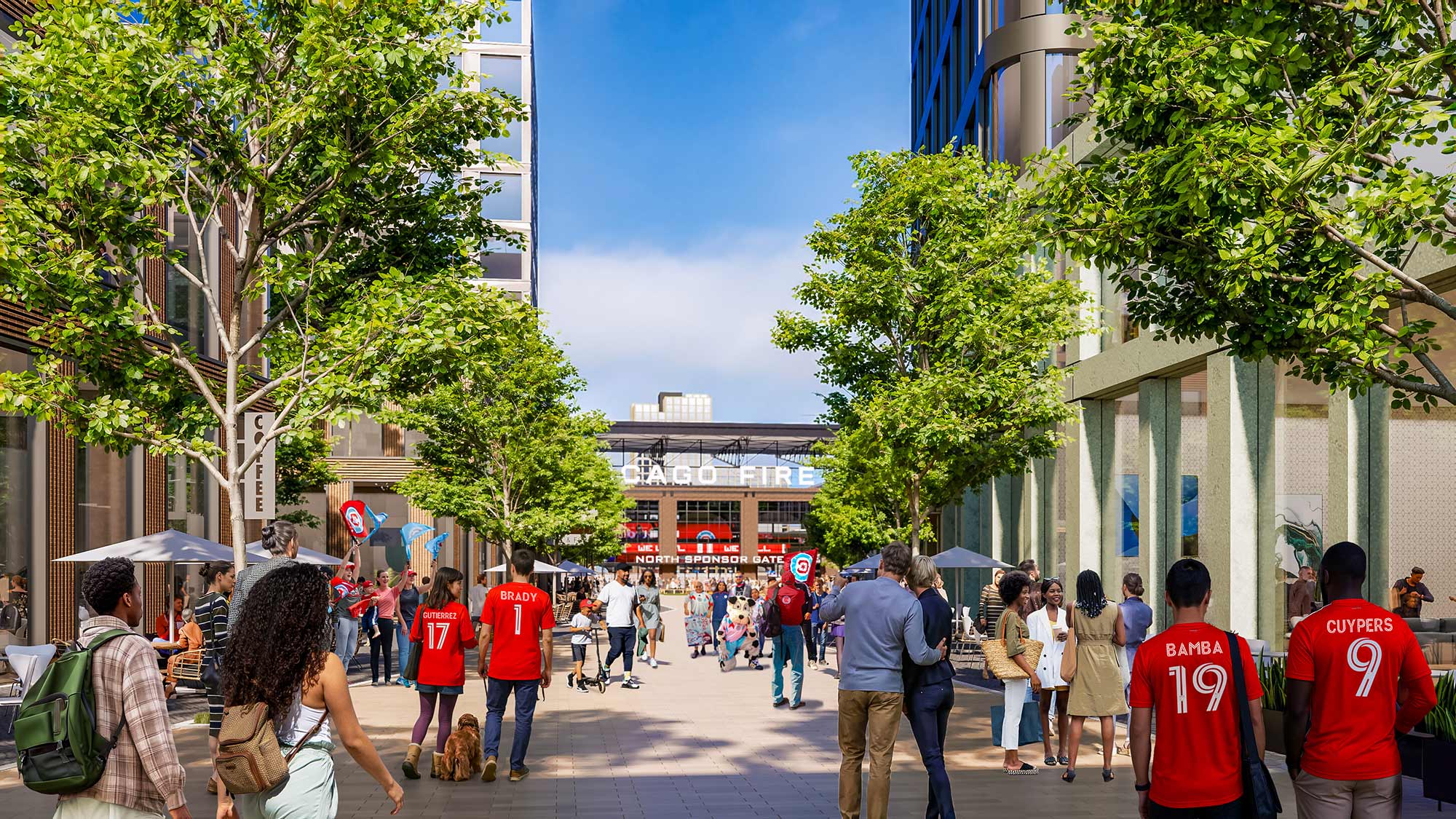 A group of people walking on a street.