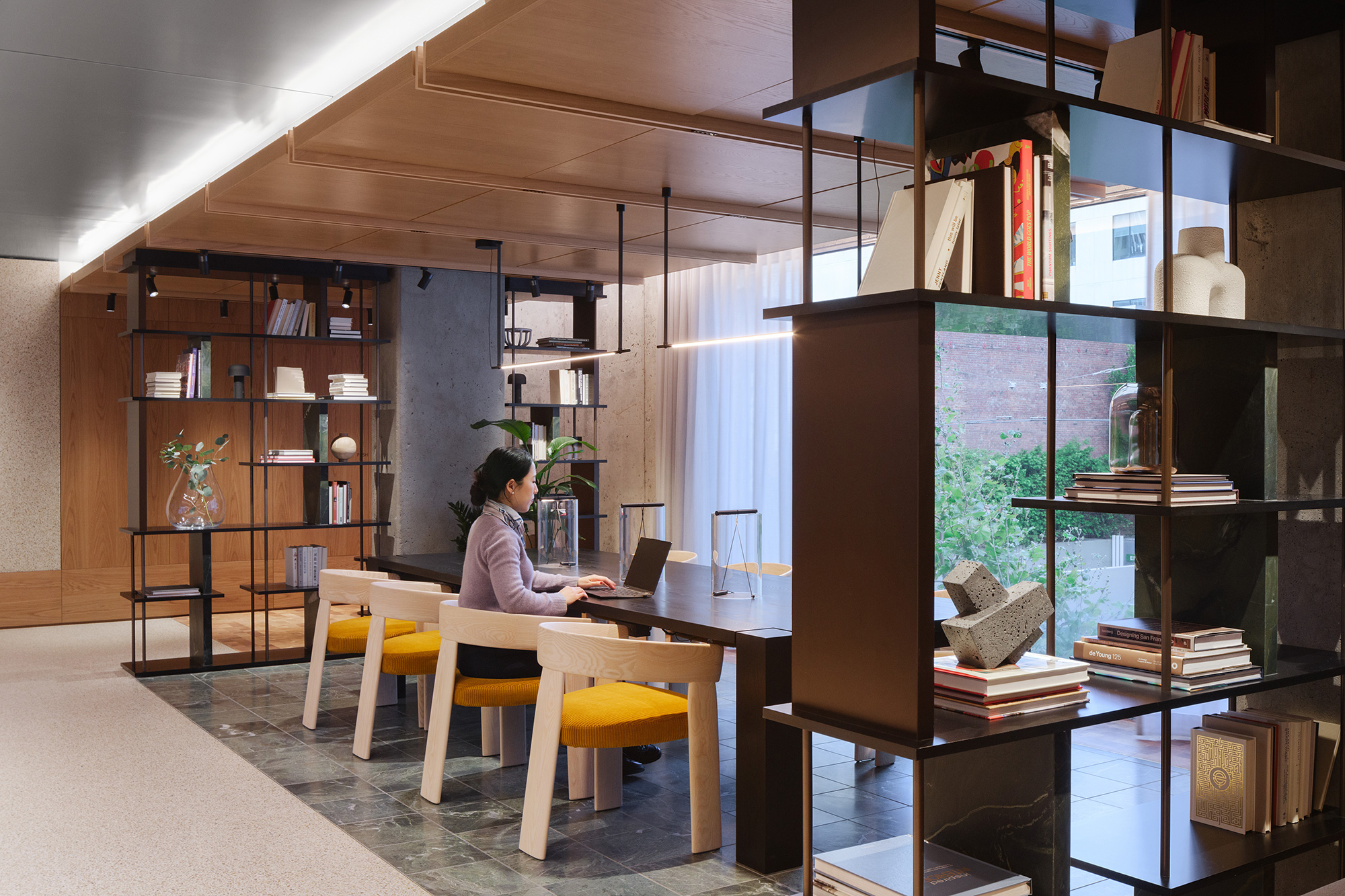 A person working on the laptop.