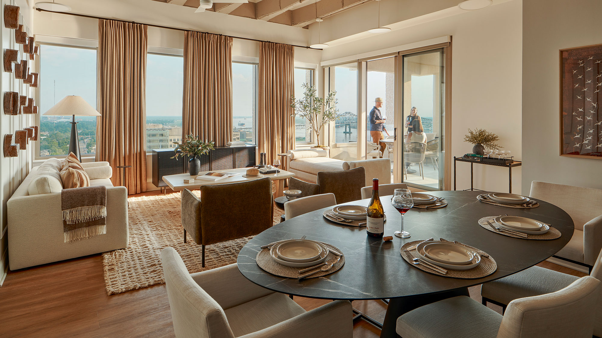 A dining room with a large window.