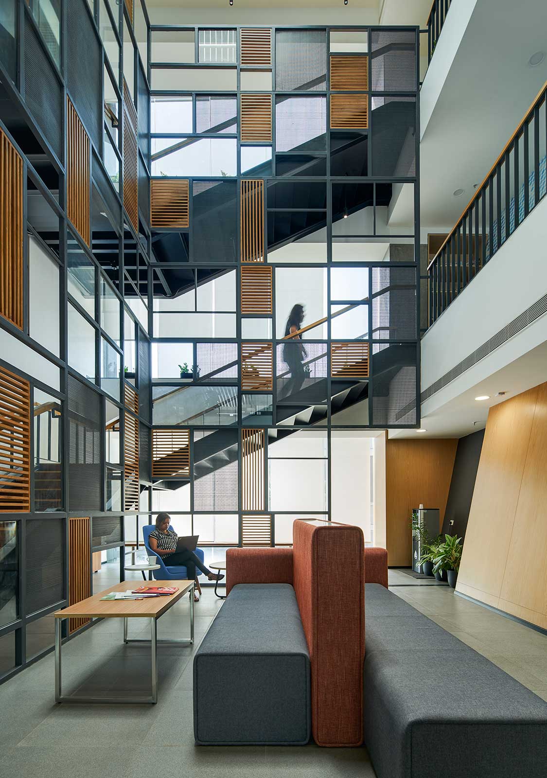 A person sitting on a staircase.