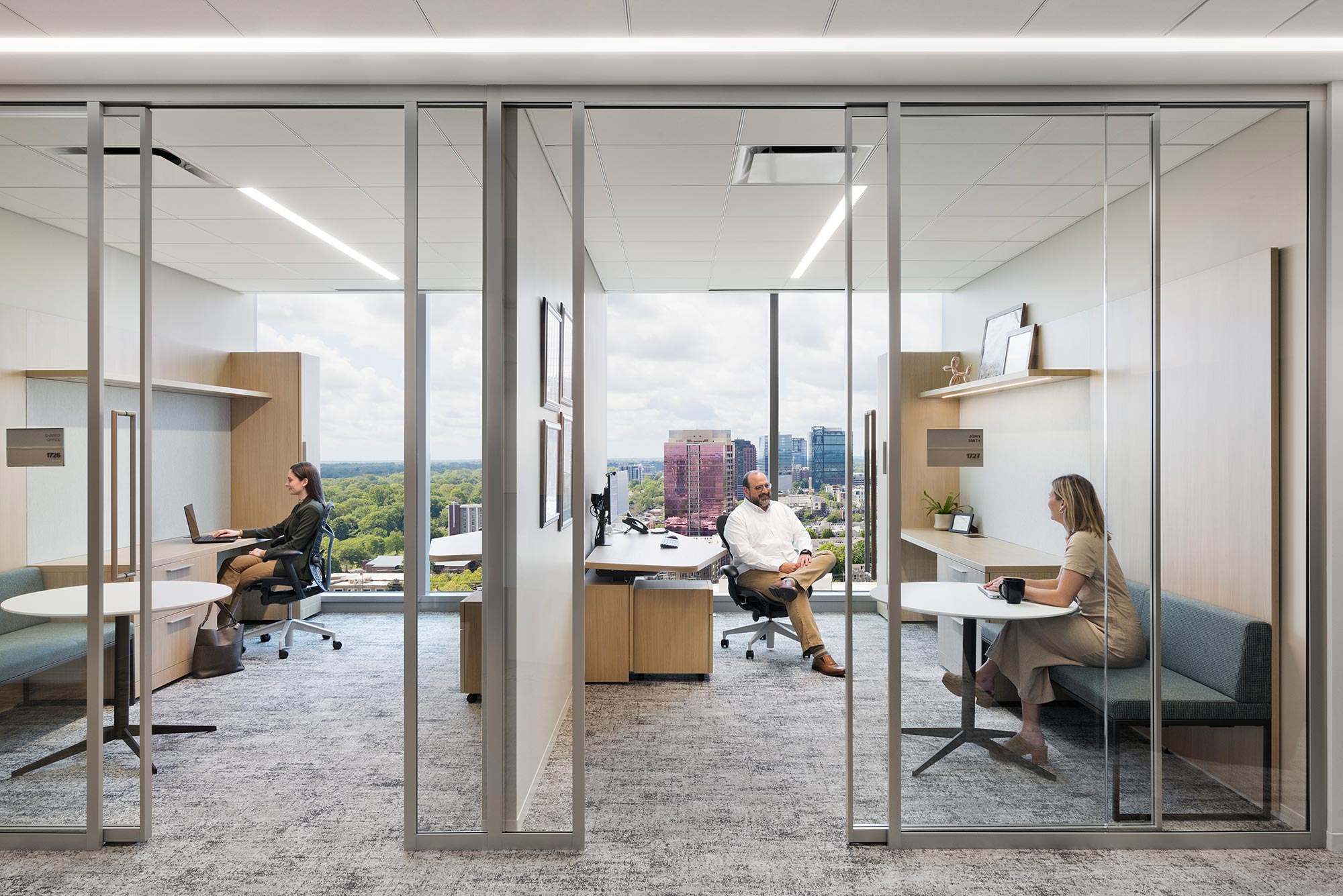 A few people sitting at a table.