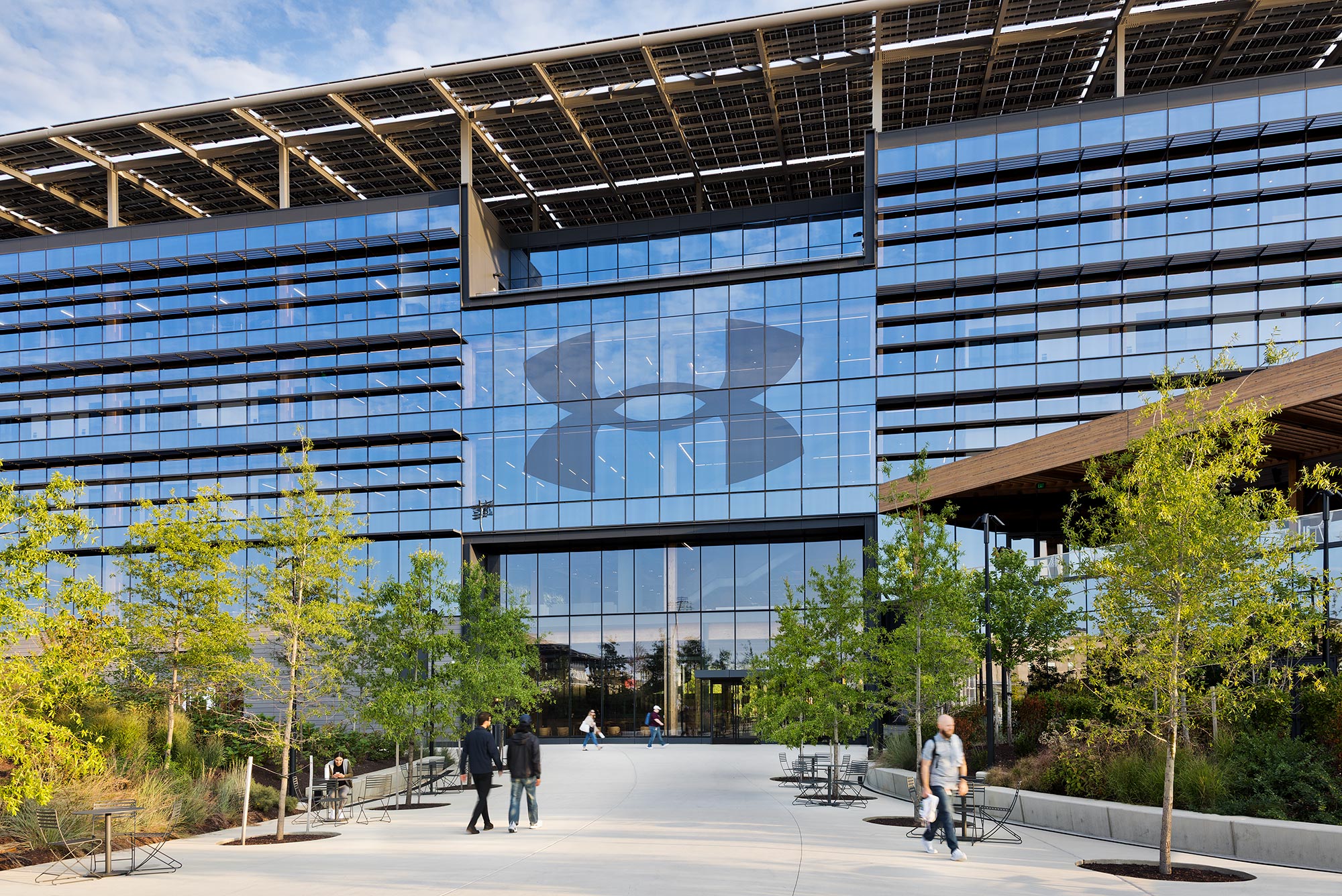 People walking outside of a building.