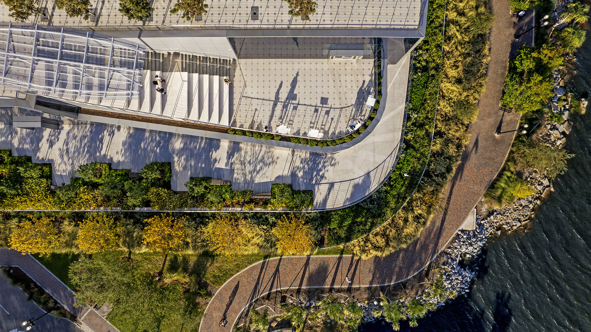 A large building with a river running through it.