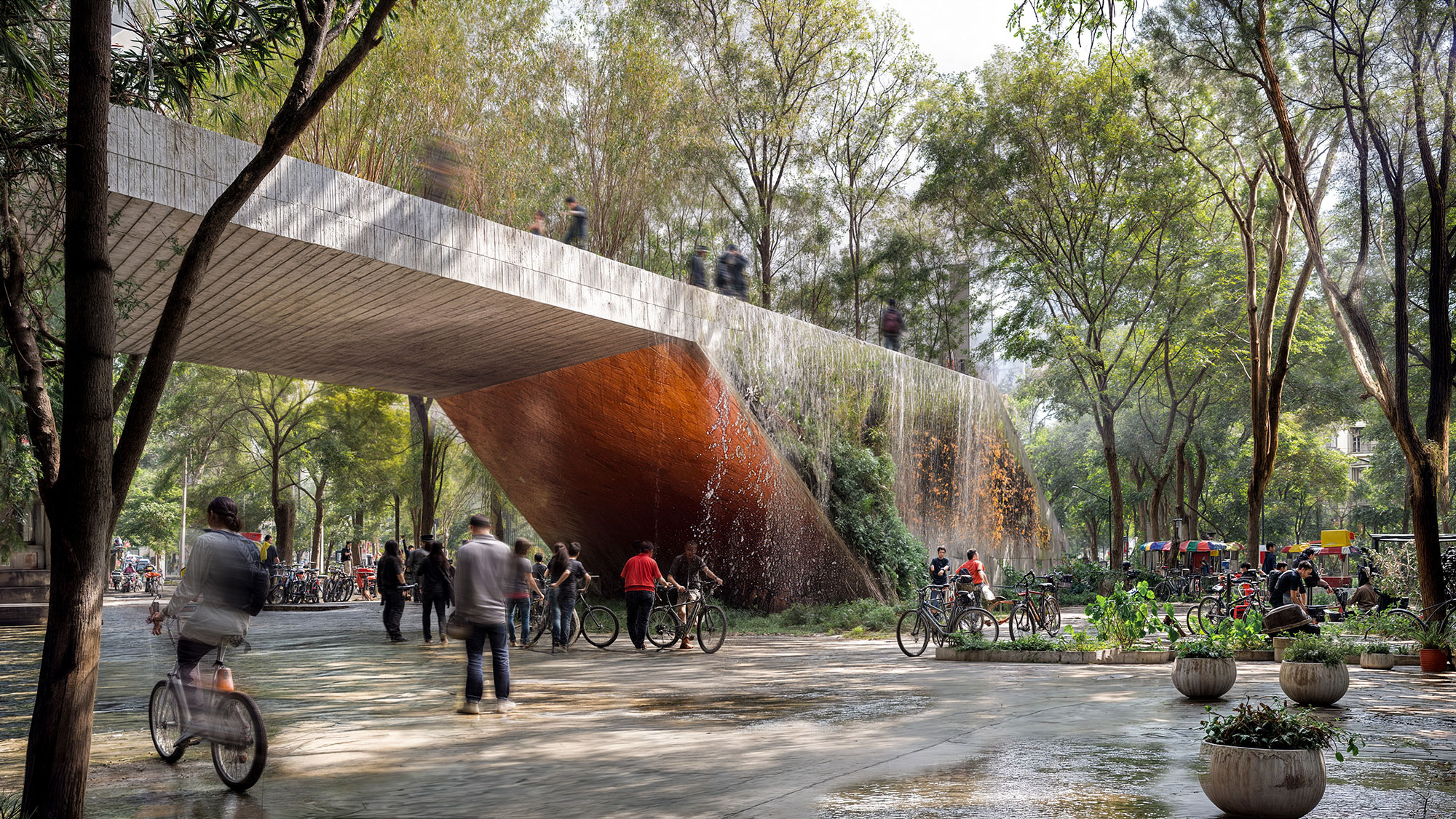 A group of people riding bikes under a bridge.
