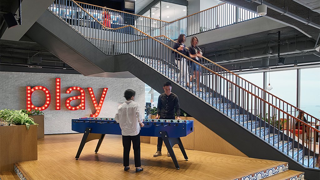 People standing on a staircase.