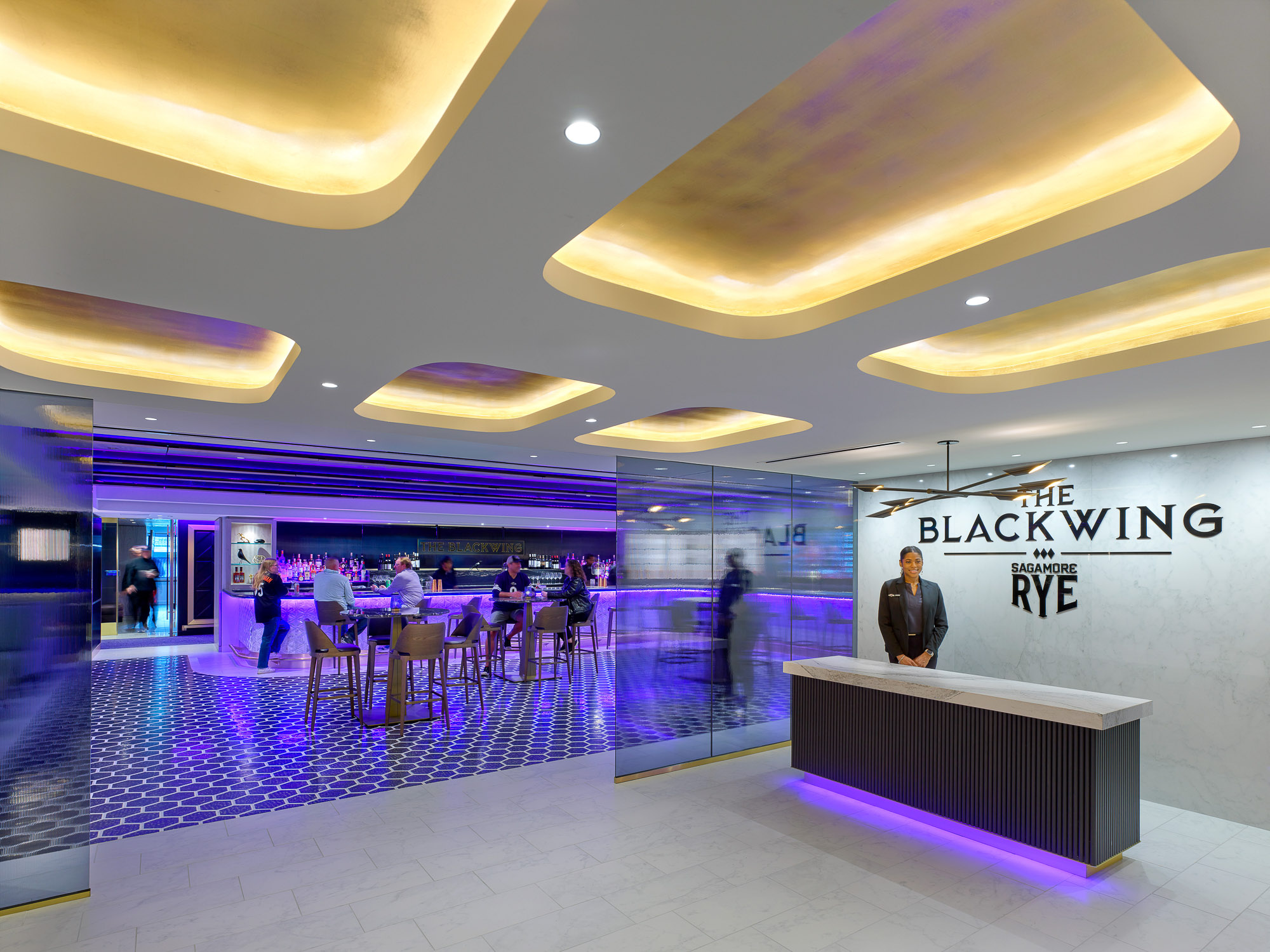 A group of people in a mall.