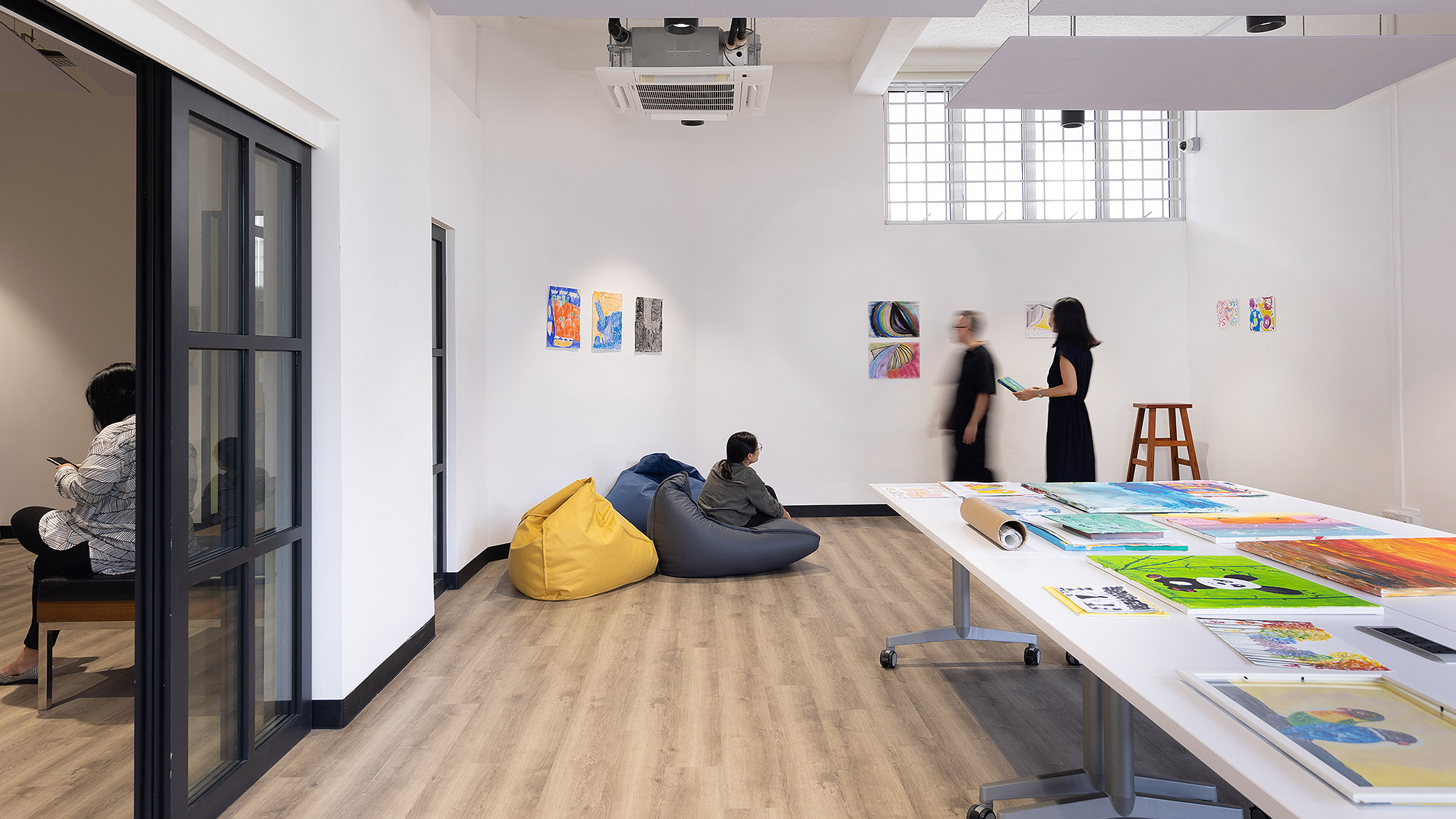 A group of people in a room.