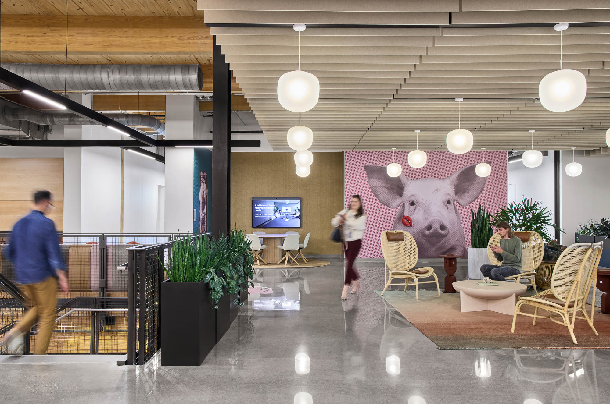 A group of people in a room.