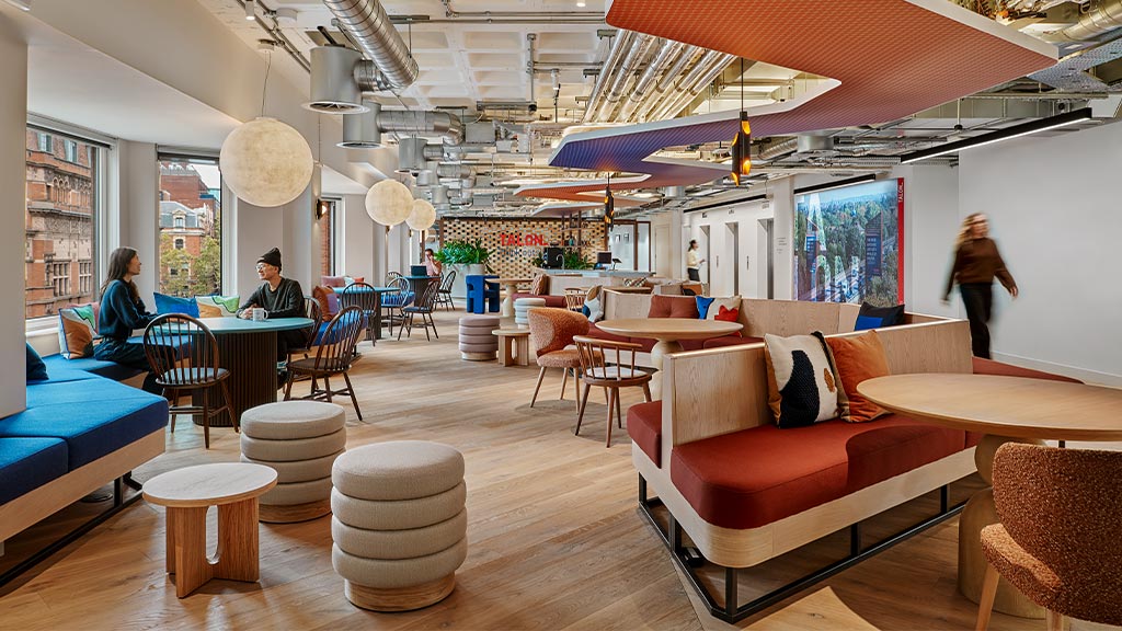 A room with tables and chairs.