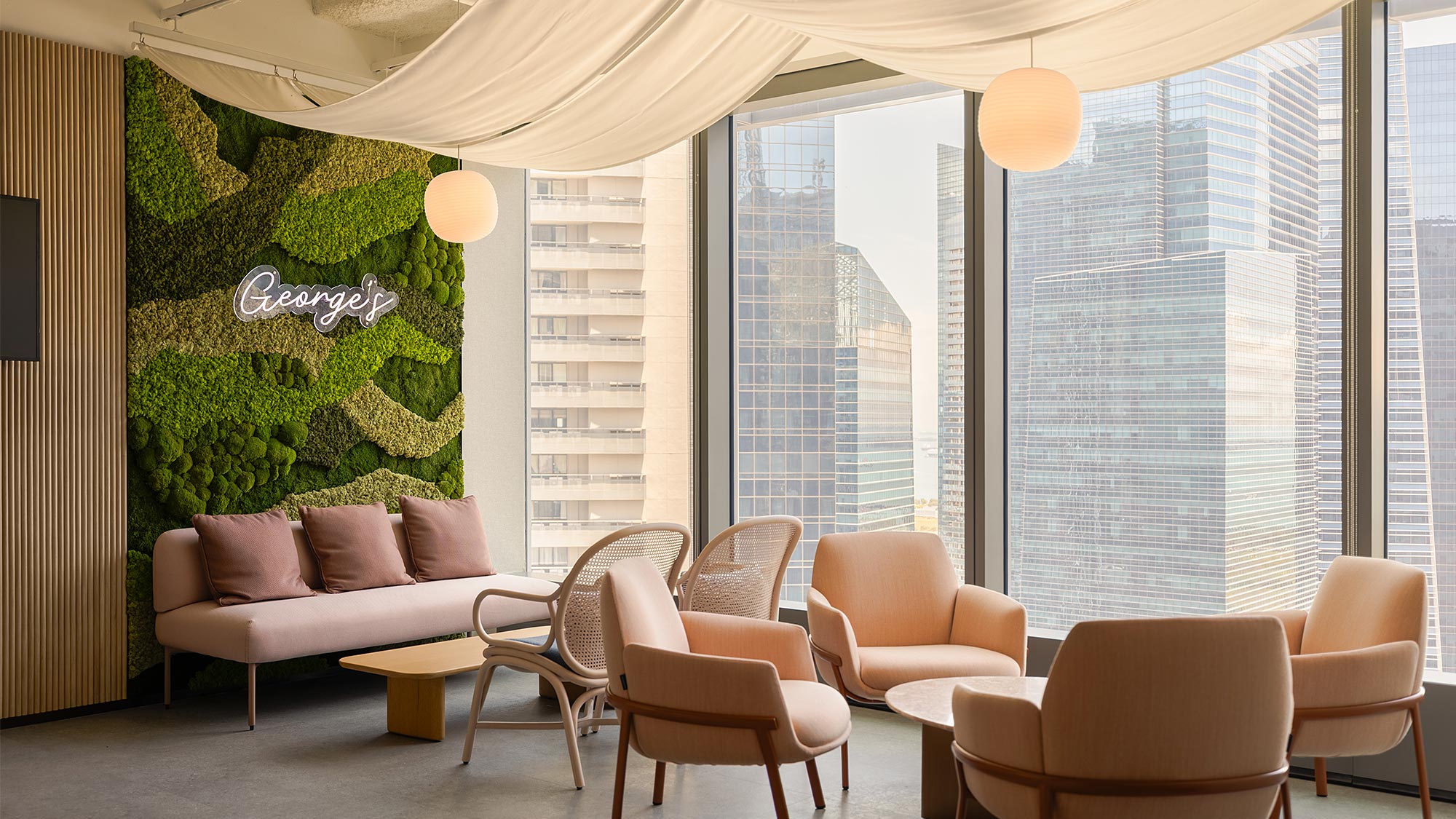 A room with chairs and a couch.