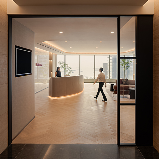 A person walking in a room.