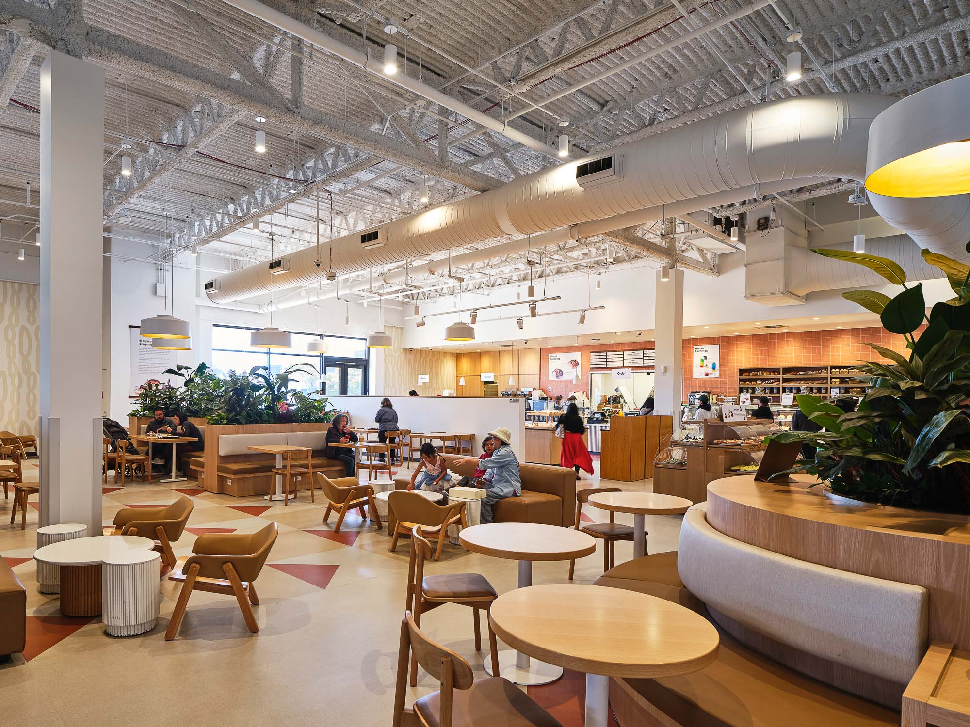 A large room with tables and chairs.