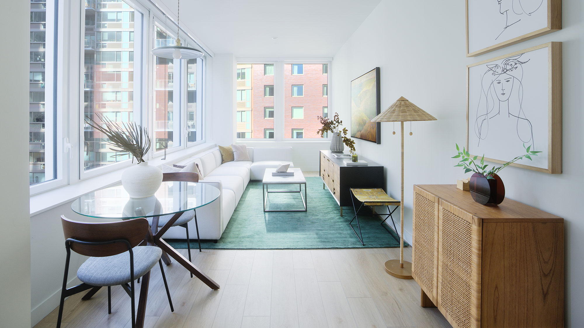 A living room with a large window.