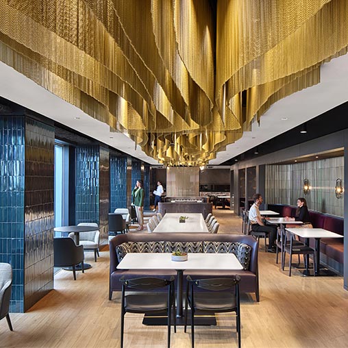 A room with tables and chairs.