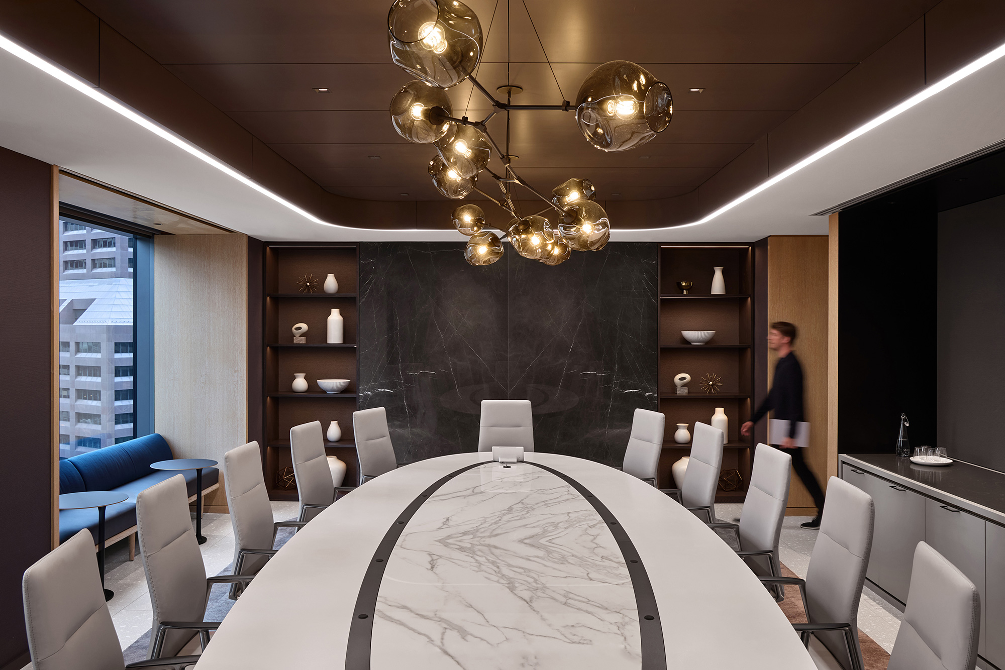 A room with a table and chairs.