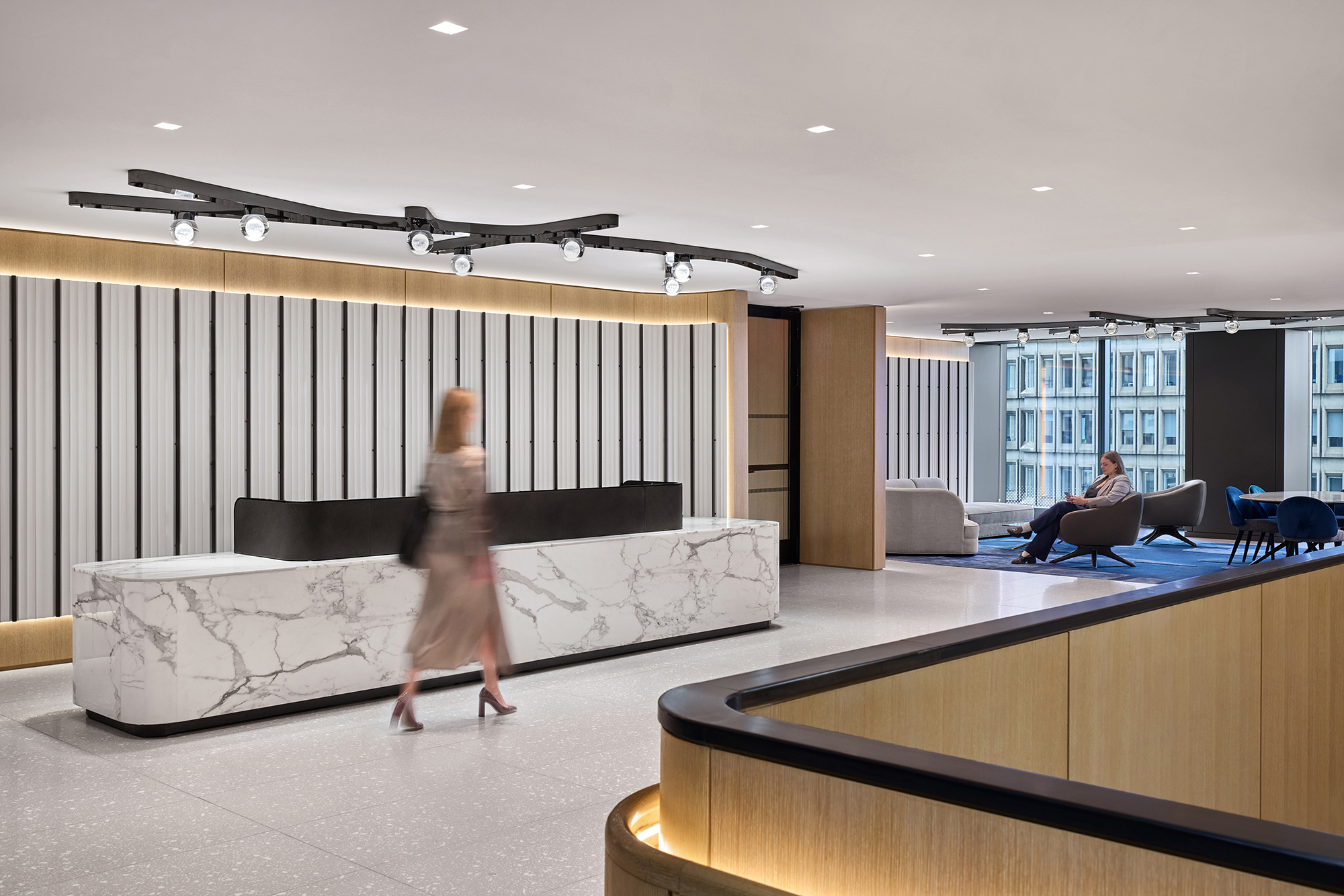 A person walking in a room.