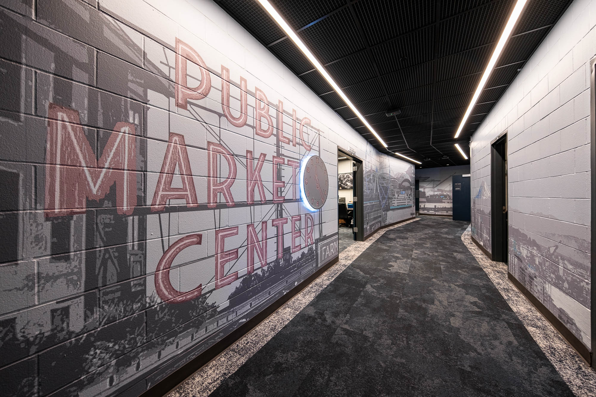 A hallway with a sign on the wall.