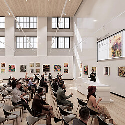 A group of people sitting in a room with art on the walls.
