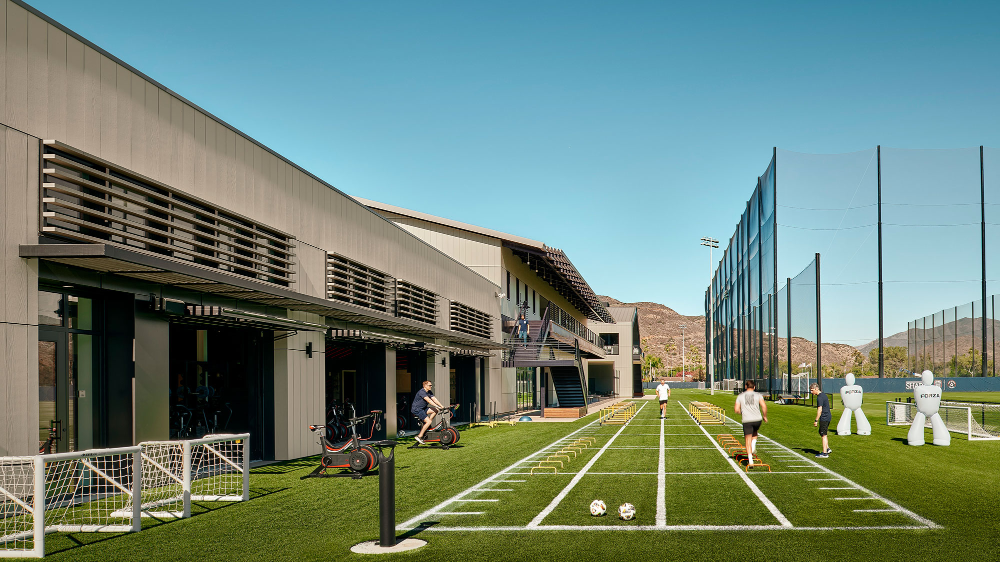 A group of people playing football.