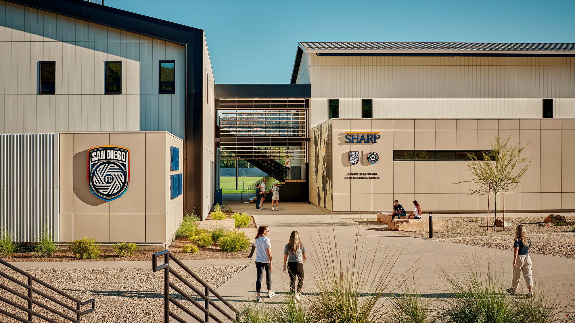 People walking near a building.
