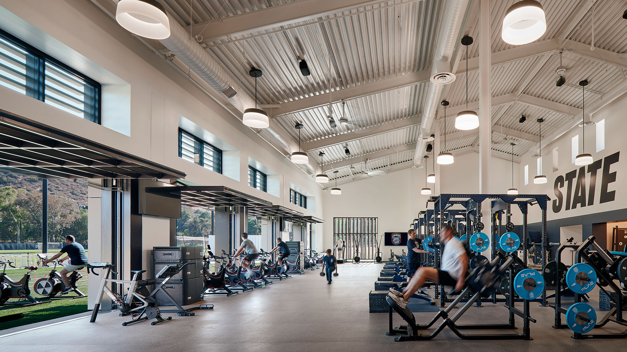 People working out in a gym.