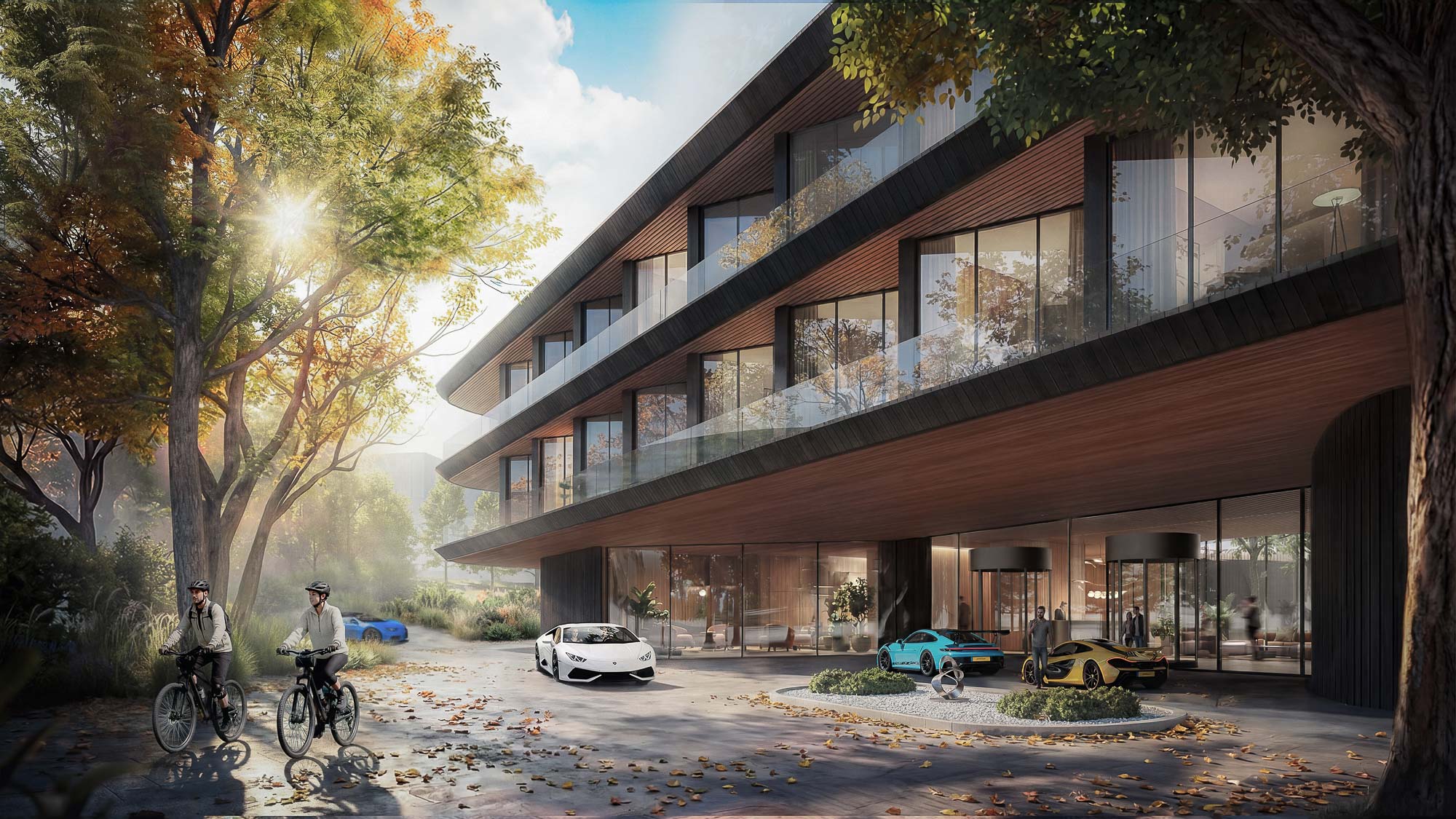 A building with a few people riding bikes.