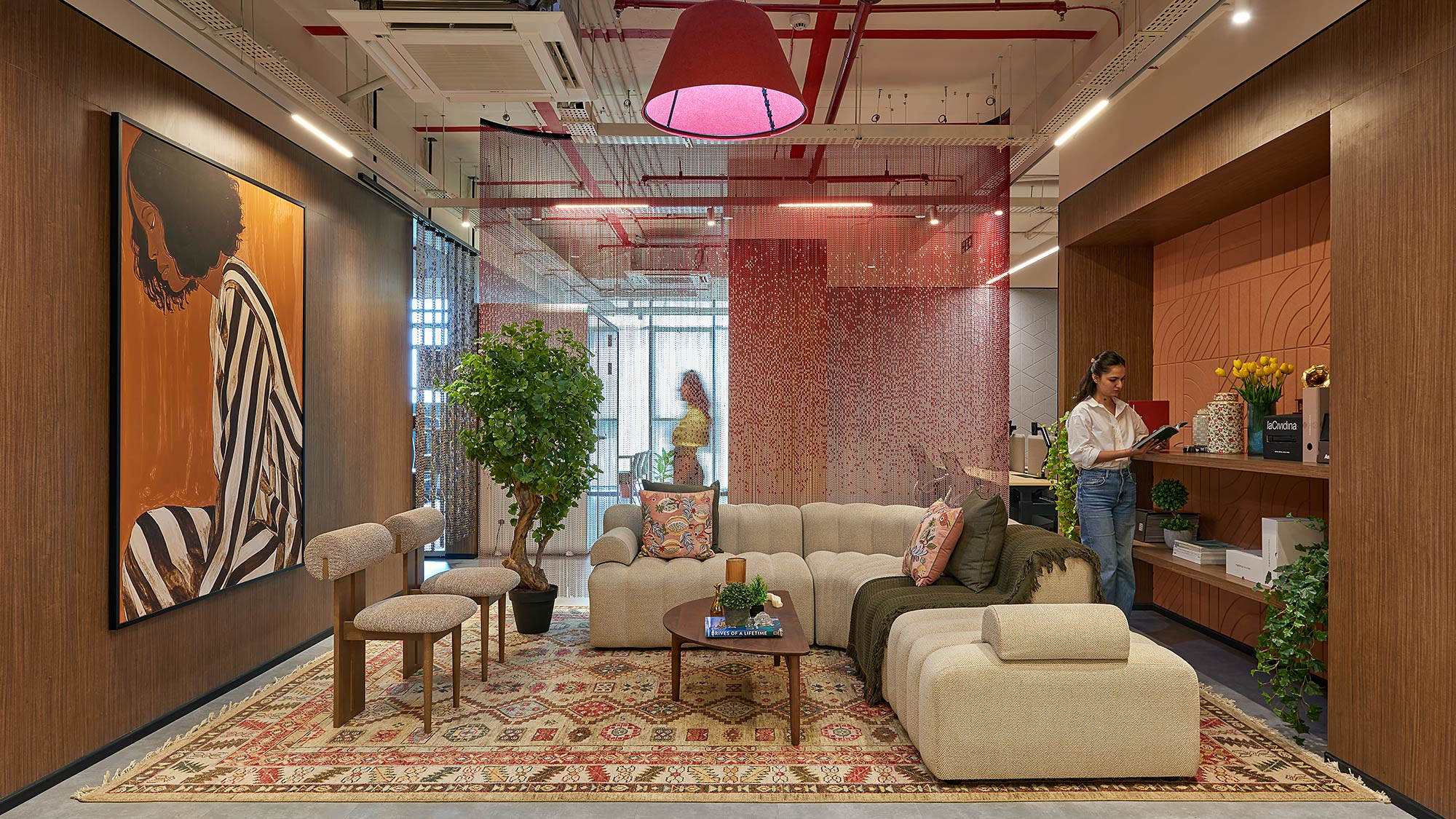 A person standing in a living room.