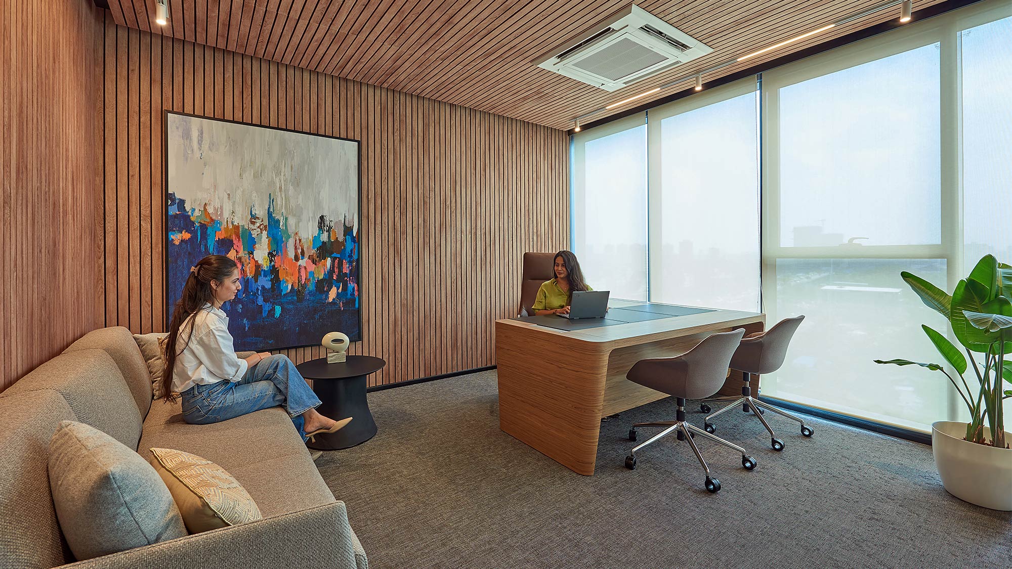 A person sitting on a couch.