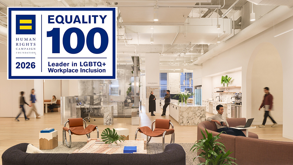 A room with people and a screen.