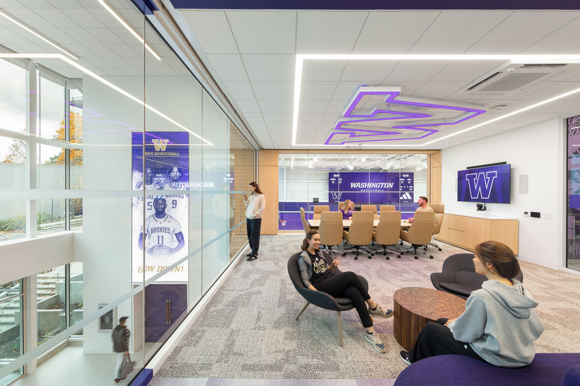 A group of people in a room.