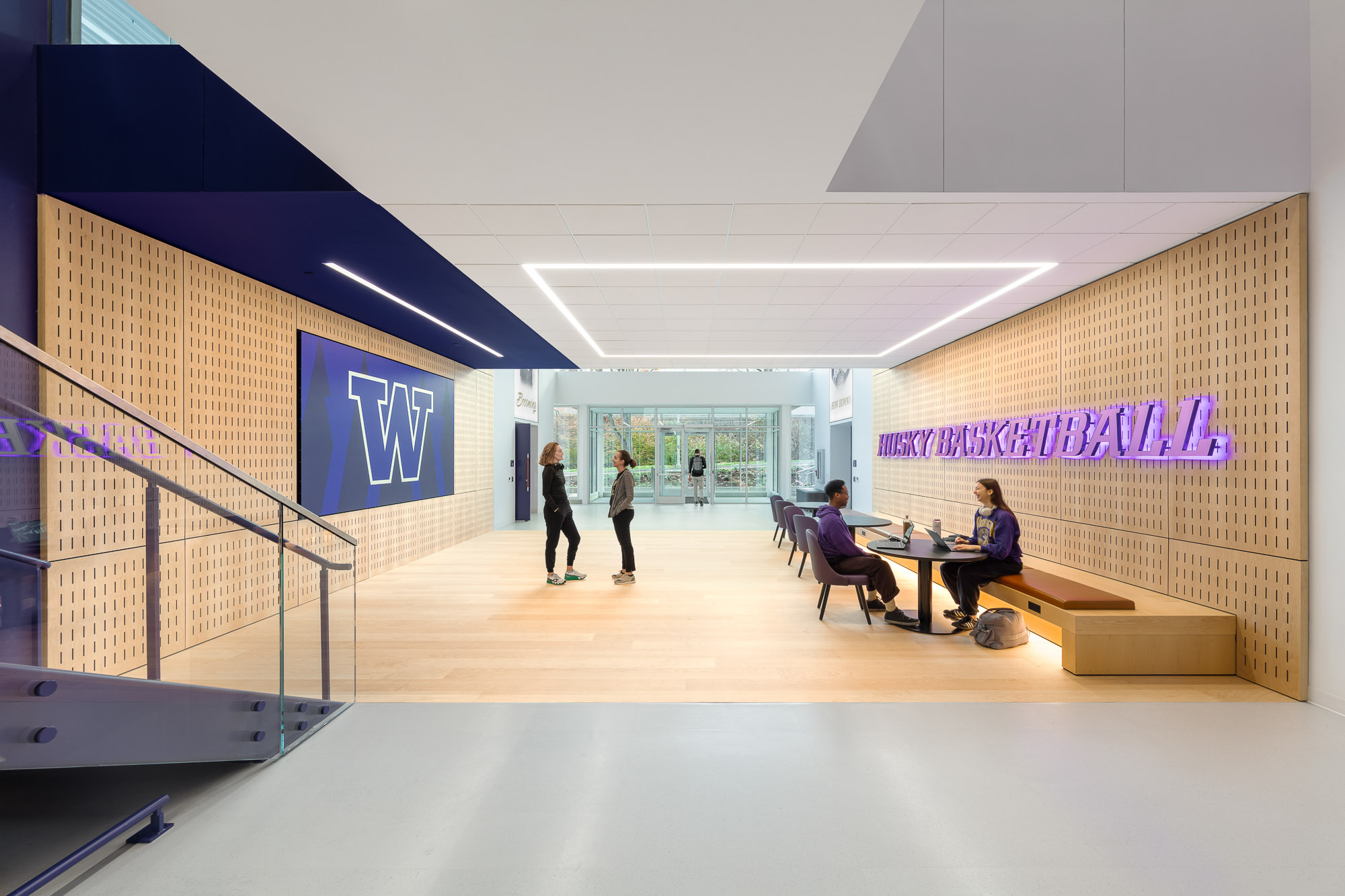 A group of people in a room.