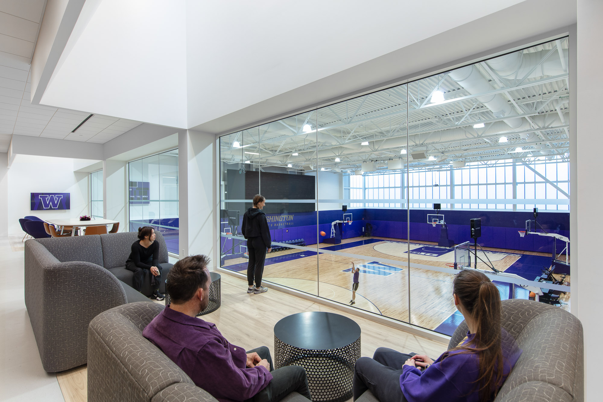 A group of people in a room.