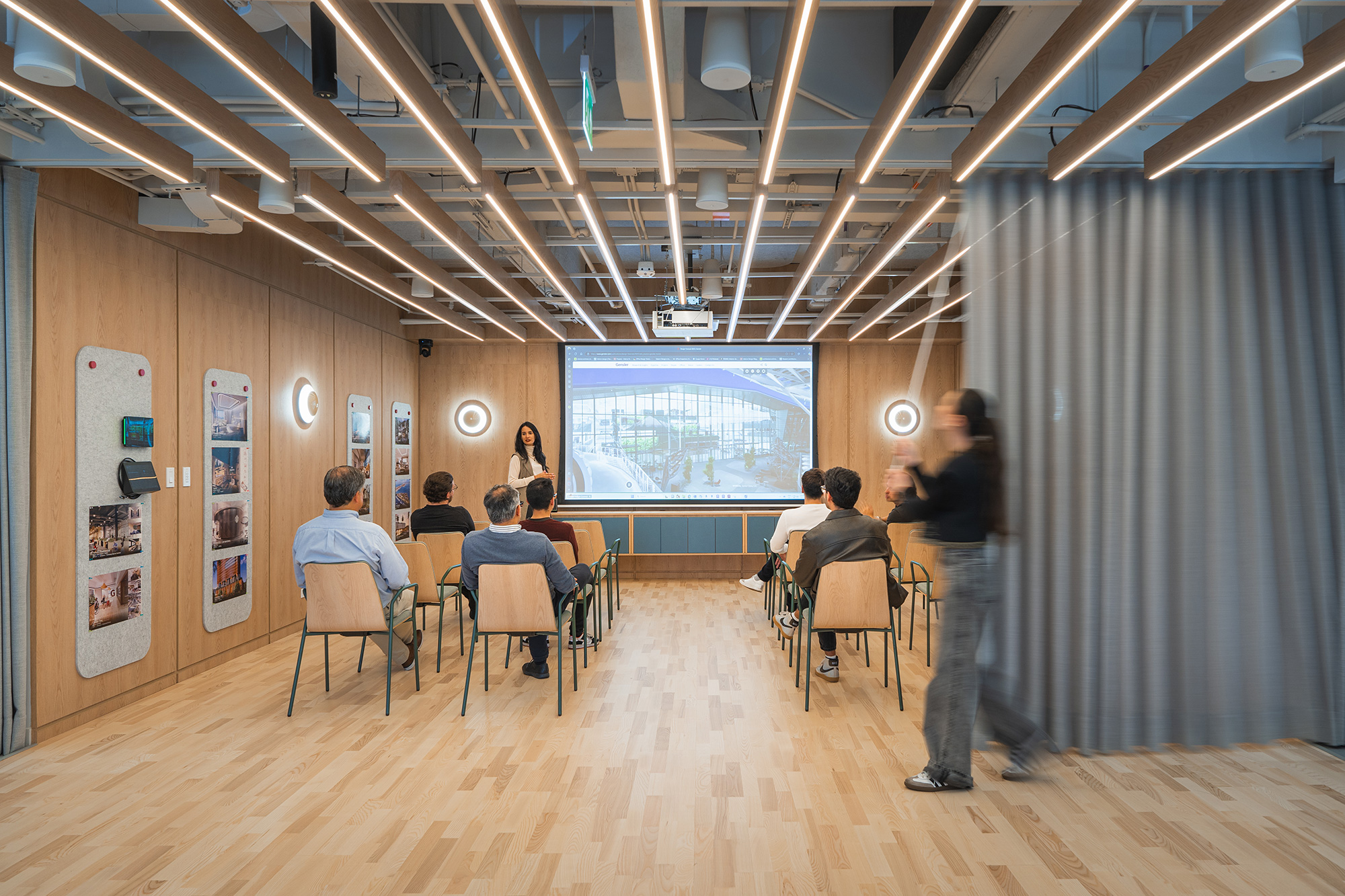 A group of people in a room.