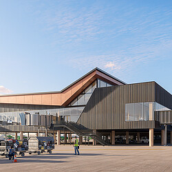 A building with a parking lot.